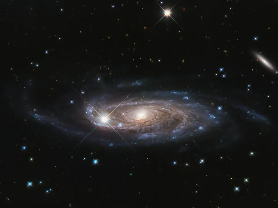 NASA Hubble reveals unique image of spiral galaxy 53 million light-years away