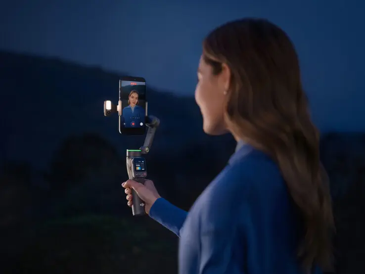 DJI Osmo Mobile 8P gimbal with integrated tripod and extension rod