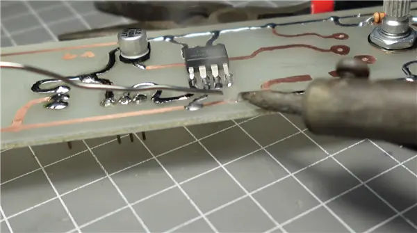 Custom art PCB with curved traces powers 3D printed exhaust fan demonstrating functional viability of manual fabrication techniques