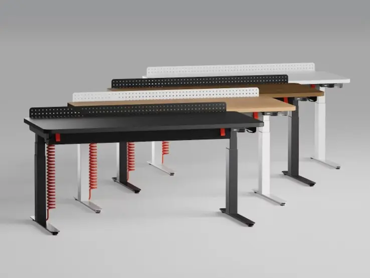 Herman Miller Coyl gaming desk with rotary dial height adjustment mechanism and integrated power strip cable management system.