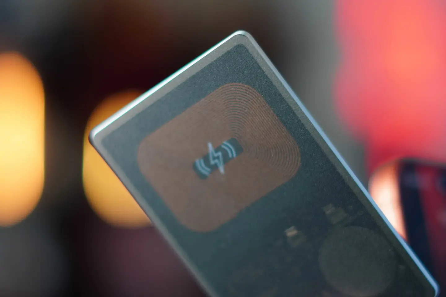KeySmart SmartCard Pro tracker sliding into a wallet