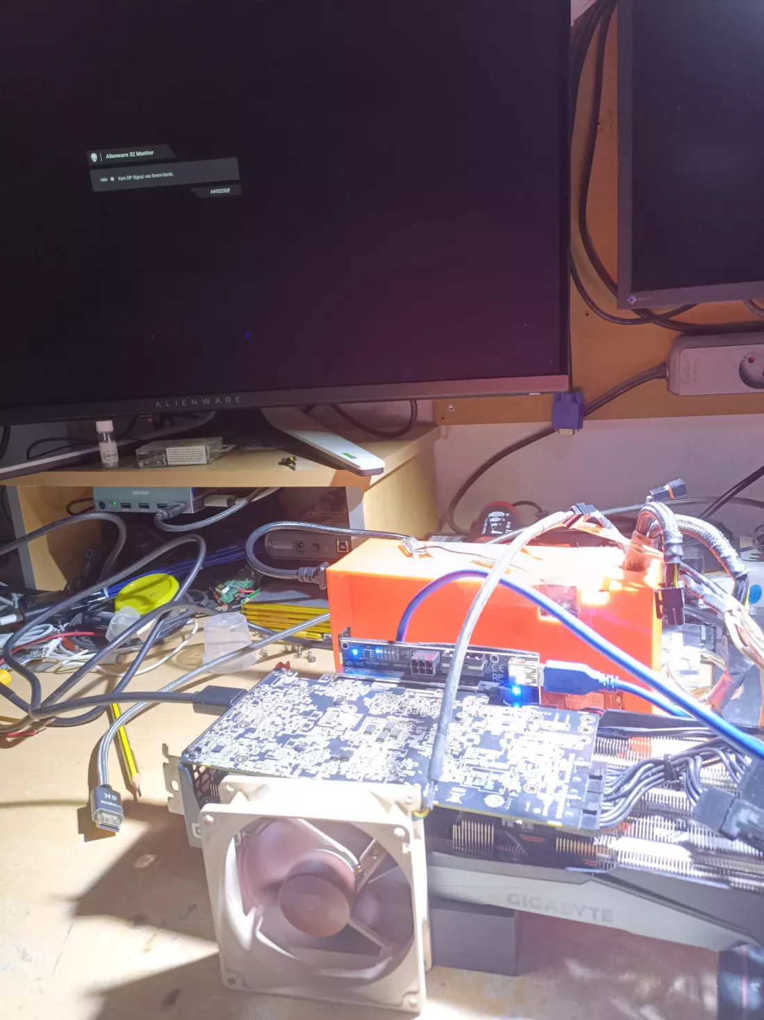Hardware modder reballing Samsung GDDR6 memory chips from a broken AMD Radeon RX 6900 XT donor GPU onto an NVIDIA RTX 3070 card.