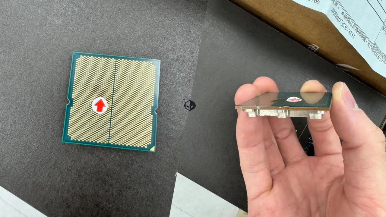 AMD Ryzen 9 7950X3D processor packaging and motherboard socket