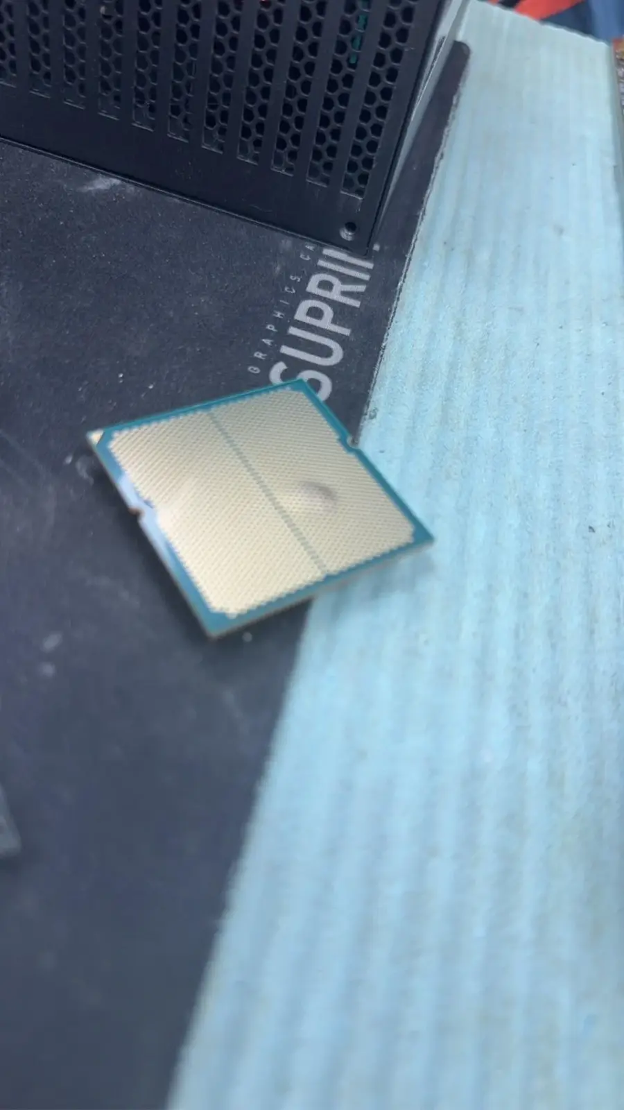 AMD Ryzen 9 7950X3D processor packaging and motherboard socket