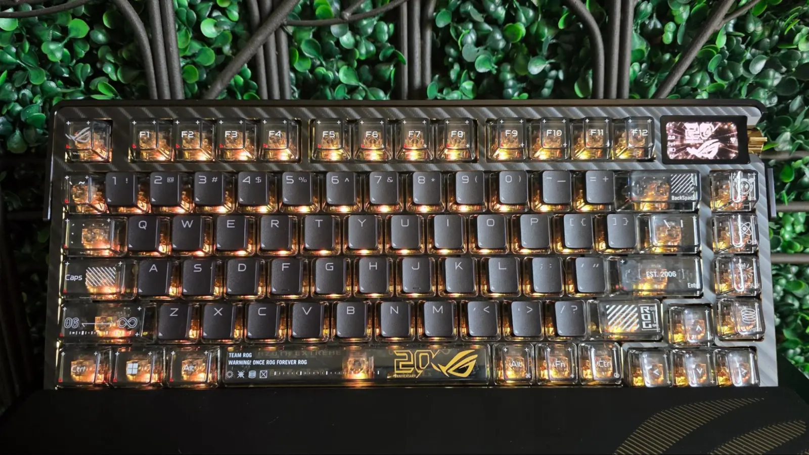 Close-up of ROG Azoth Extreme Edition 20 AMOLED touchscreen and control knob