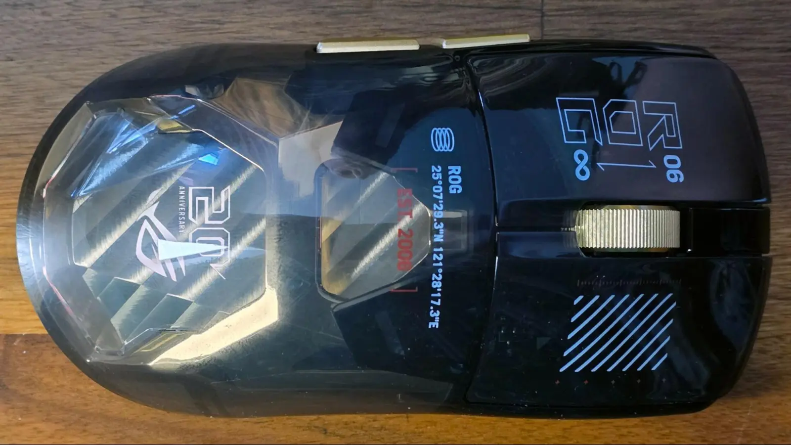 Close-up of ROG Harpe II Extreme Edition 20 showing sensor and buttons