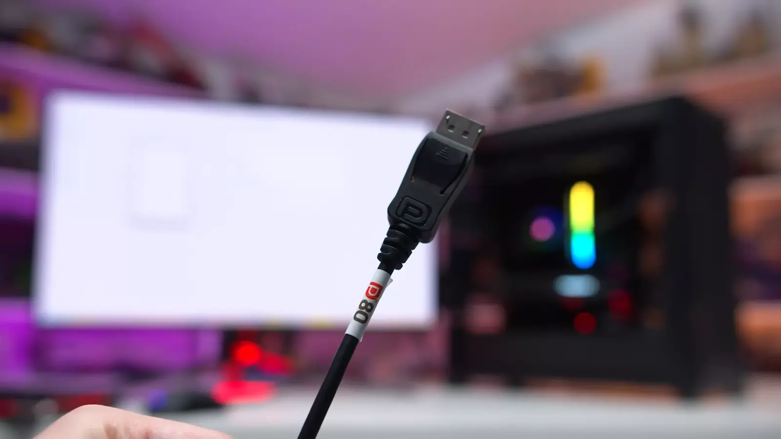 DisplayPort 2.1 cable connected to a monitor