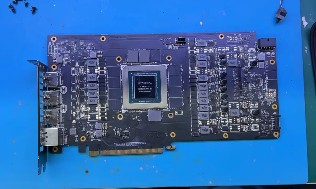 Close-up of a counterfeit graphics card with visible plastic GPU die