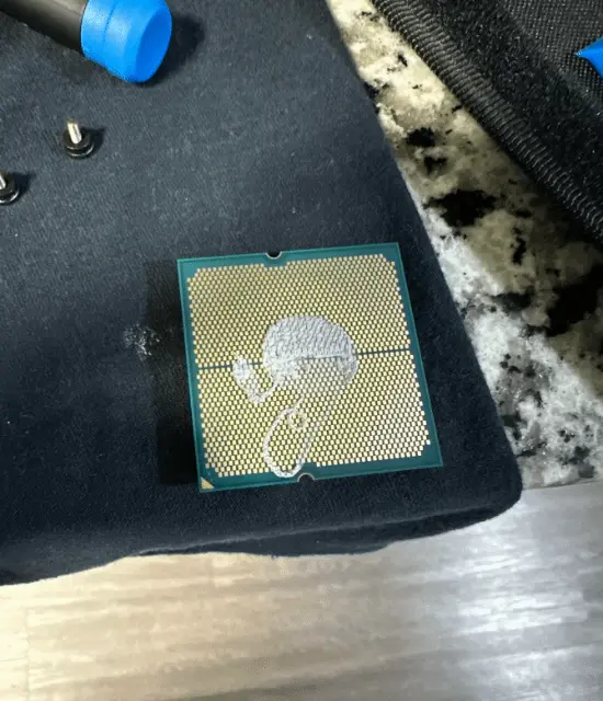 Motherboard CPU Socket Damage from Thermal Paste Causes Boot Failure