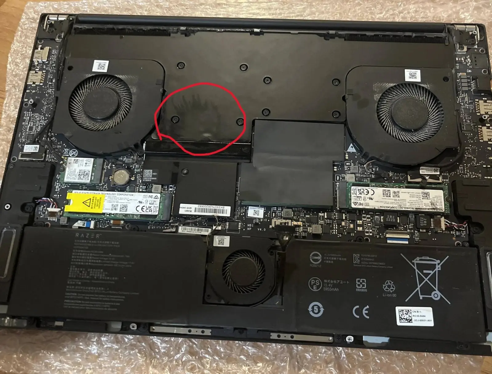 Condensation visible on the vapor chamber of a Razer Blade 18 laptop