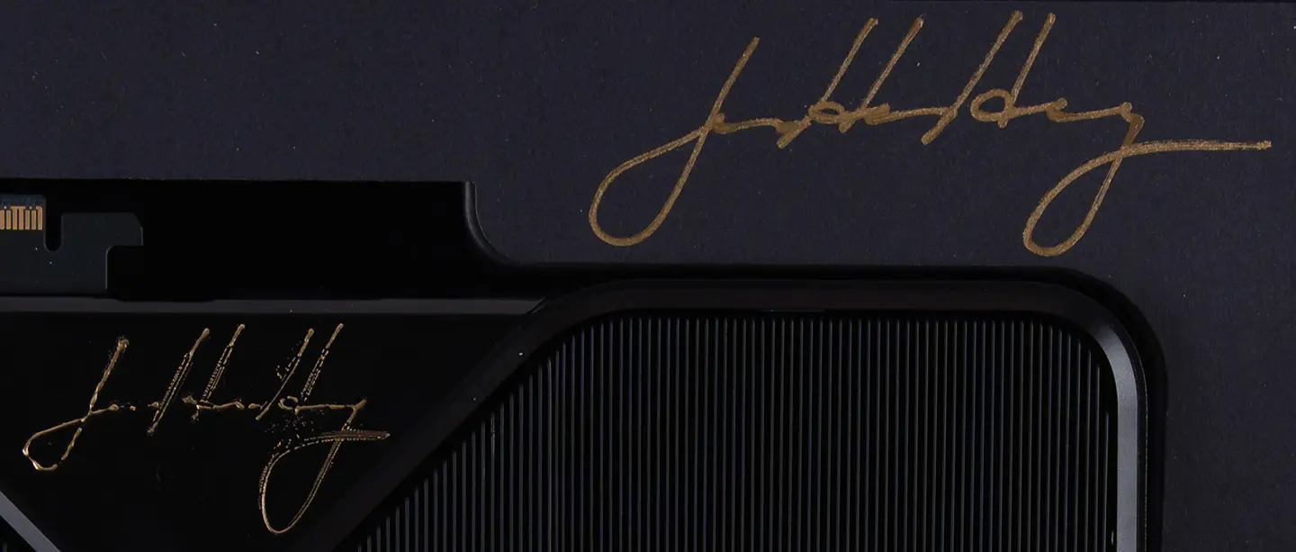NVIDIA RTX Pro 6000 Blackwell graphics card with Jensen Huang signatures