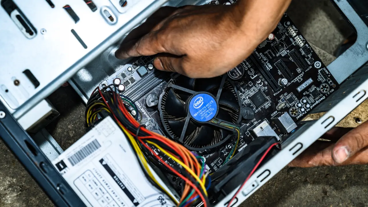 Close-up of computer hardware components including a processor and memory modules
