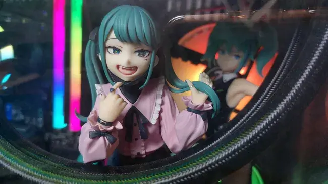 Anime figures inside a Hyte Y40 PC case
