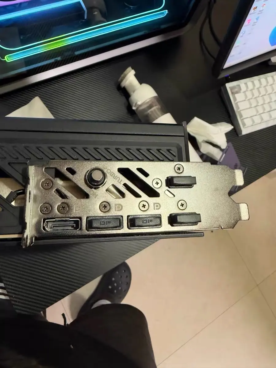 Colorful RTX 5080 graphics card with blue heat oxidation on the metal bracket
