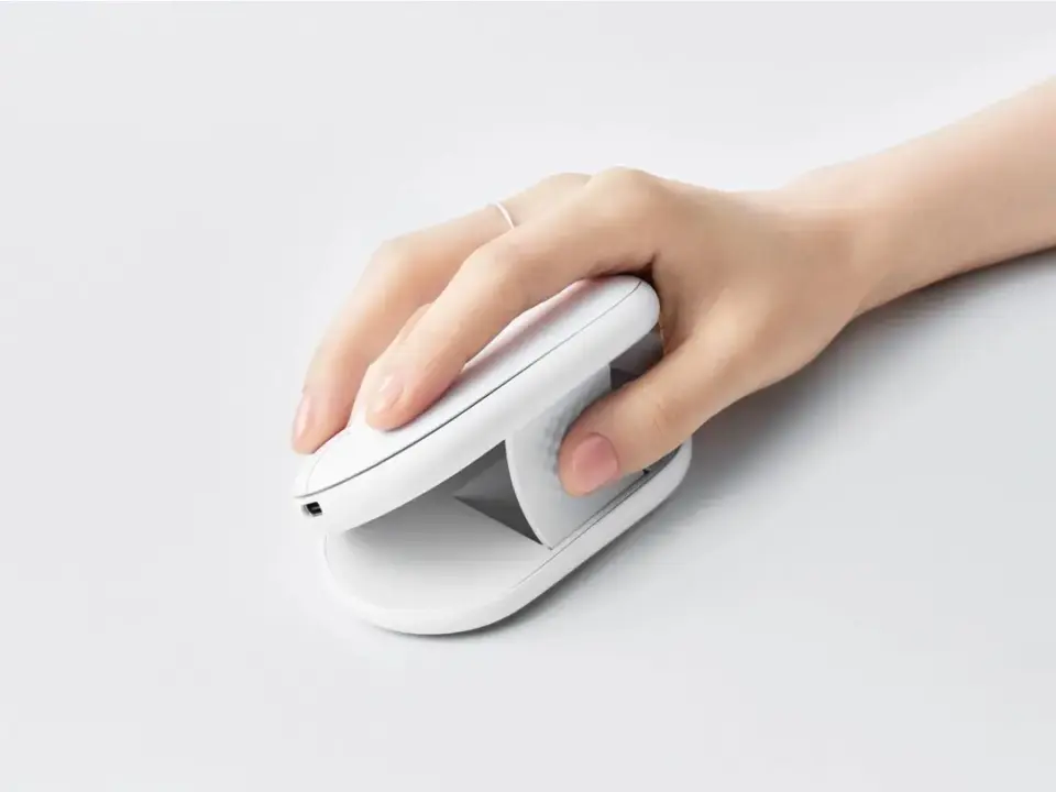 Logitech Pebble Up transforms from standard to vertical ergonomic mouse